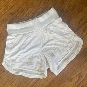 Athleta soft shorts with mesh accents and pockets